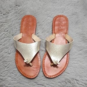 Mad Love gold thong sandals